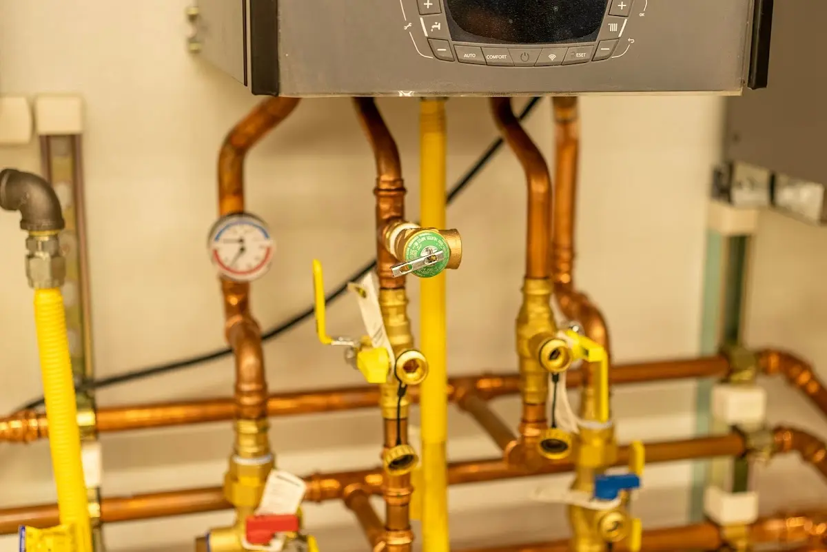 Licensed technician providing Backflow Prevention for a homeowner in Le Roy